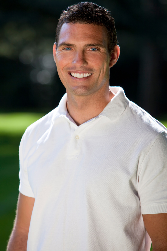 Handsome Thirties Man in White Polo Shirt